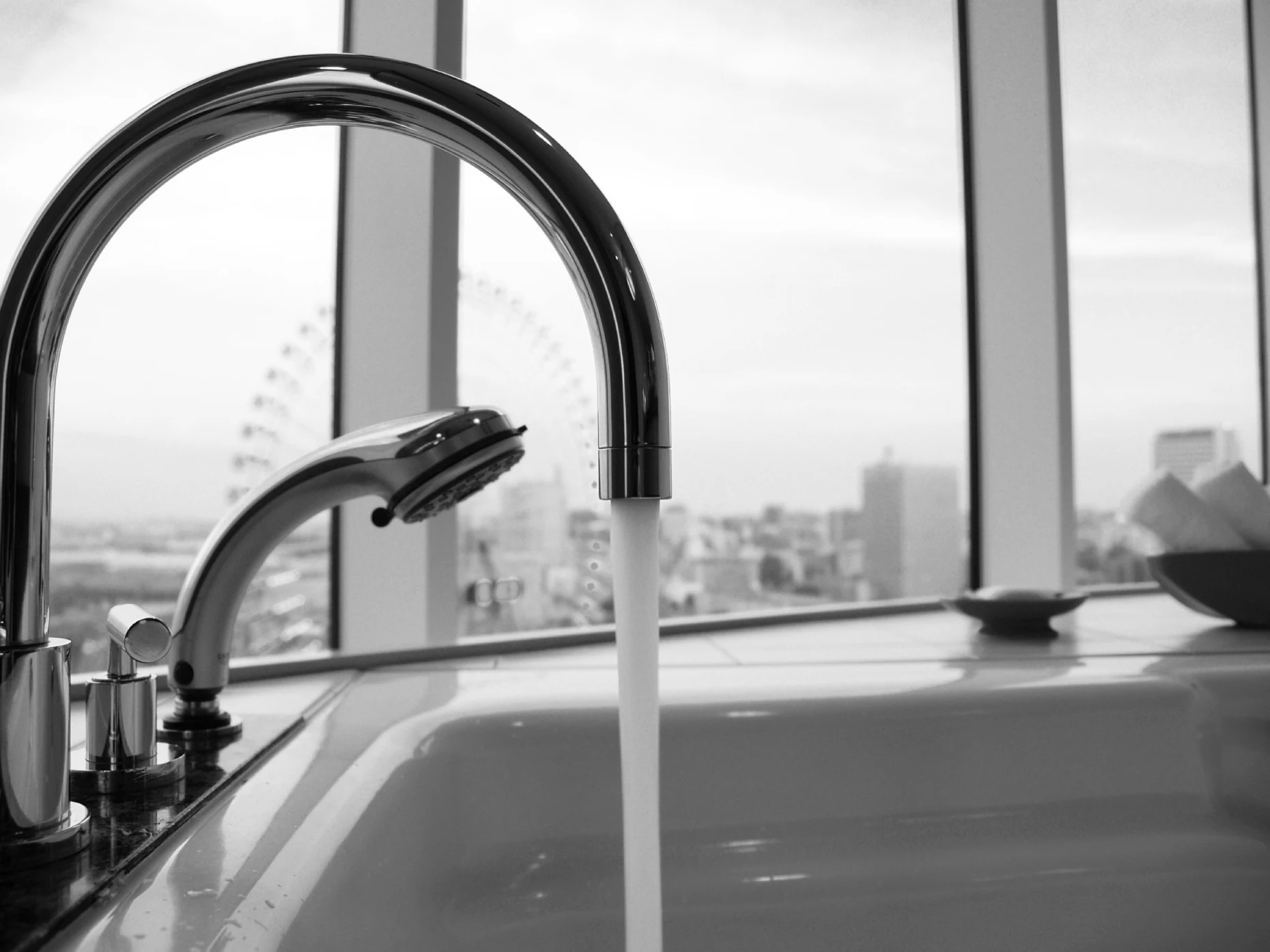 The Dangers of Ignoring a Leaky Faucet: Water Damage